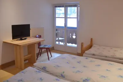 Ein Bett oder Betten in einem Zimmer der Unterkunft Rauwieslhof