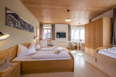 Ein Bett oder Betten in einem Zimmer der Unterkunft Gasthaus Kammerhof Angath