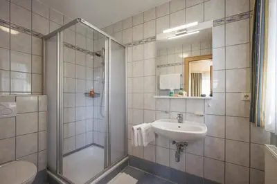 Ein Badezimmer in der Unterkunft Gasthaus Kammerhof Angath
