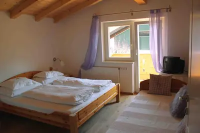 Ein Bett oder Betten in einem Zimmer der Unterkunft Haus Senoner