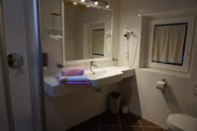 Ein Badezimmer in der Unterkunft Haus Senoner