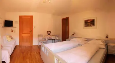 Ein Bett oder Betten in einem Zimmer der Unterkunft Haus Senoner