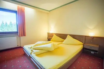 Ein Bett oder Betten in einem Zimmer der Unterkunft Appartement Pillersee
