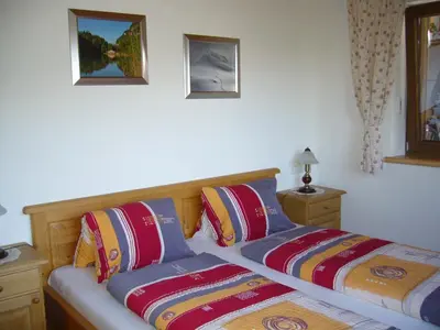 Ein Bett oder Betten in einem Zimmer der Unterkunft Ferienwohnung Marlene