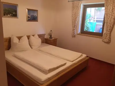Ein Bett oder Betten in einem Zimmer der Unterkunft Ferienwohnung Marlene