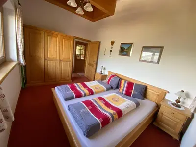 Ein Bett oder Betten in einem Zimmer der Unterkunft Ferienwohnung Marlene
