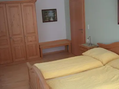 Ein Bett oder Betten in einem Zimmer der Unterkunft Apartment Neuhauser