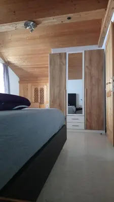 Ein Bett oder Betten in einem Zimmer der Unterkunft Apartment Evelyn