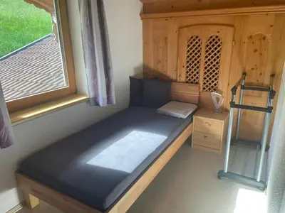 Ein Bett oder Betten in einem Zimmer der Unterkunft Apartment Evelyn