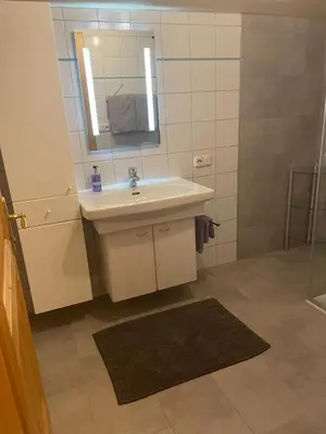 Ein Badezimmer in der Unterkunft Apartment Evelyn