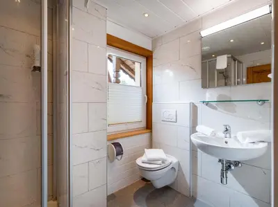 Ein Badezimmer in der Unterkunft Haus Tirol