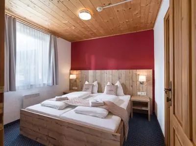 Ein Bett oder Betten in einem Zimmer der Unterkunft Haus Tirol