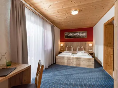 Ein Bett oder Betten in einem Zimmer der Unterkunft Haus Tirol
