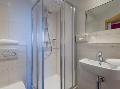 Ein Badezimmer in der Unterkunft Haus Tirol
