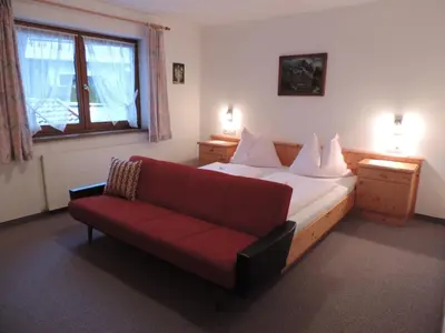 Ein Bett oder Betten in einem Zimmer der Unterkunft Ferienwohnung Johann Niedermoser
