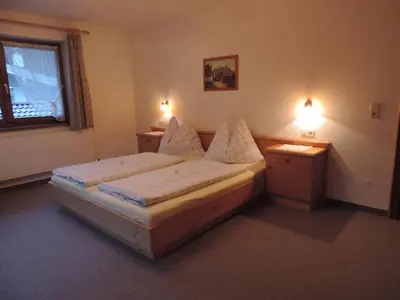 Ein Bett oder Betten in einem Zimmer der Unterkunft Ferienwohnung Johann Niedermoser