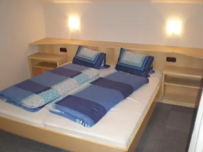 Ein Bett oder Betten in einem Zimmer der Unterkunft Haus Lindner