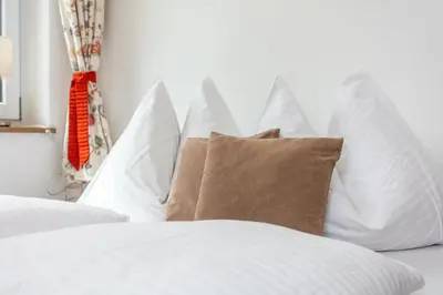 Ein Bett oder Betten in einem Zimmer der Unterkunft Haus Garten An der Sonne