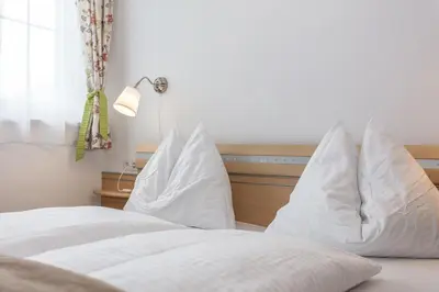 Ein Bett oder Betten in einem Zimmer der Unterkunft Haus Garten An der Sonne