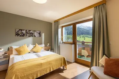 Ein Bett oder Betten in einem Zimmer der Unterkunft Bergviewhaus Apartments