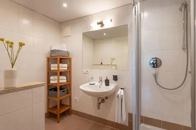 Ein Badezimmer in der Unterkunft Bergviewhaus Apartments