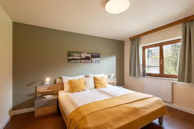 Ein Bett oder Betten in einem Zimmer der Unterkunft Bergviewhaus Apartments