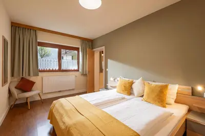 Ein Bett oder Betten in einem Zimmer der Unterkunft Bergviewhaus Apartments