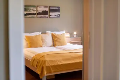 Ein Bett oder Betten in einem Zimmer der Unterkunft Bergviewhaus Apartments