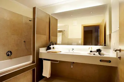 Ein Badezimmer in der Unterkunft Sonnblick Apartments und Zimmer - Nationalpark Sommercard inklusive