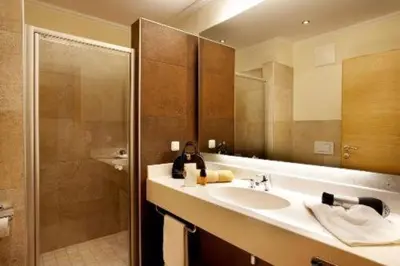Ein Badezimmer in der Unterkunft Sonnblick Apartments und Zimmer - Nationalpark Sommercard inklusive