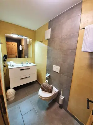Ein Badezimmer in der Unterkunft Hutmann