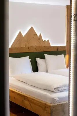 Ein Bett oder Betten in einem Zimmer der Unterkunft Hutmann