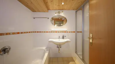 Ein Badezimmer in der Unterkunft Chalet Moralee Kitzbühel, Whirlpool & Alpenblick