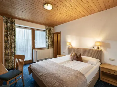 Ein Bett oder Betten in einem Zimmer der Unterkunft Landhaus Schneeberger