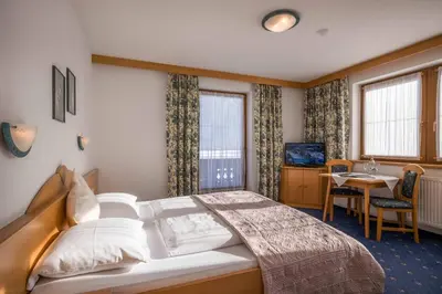 Ein Bett oder Betten in einem Zimmer der Unterkunft Landhaus Schneeberger