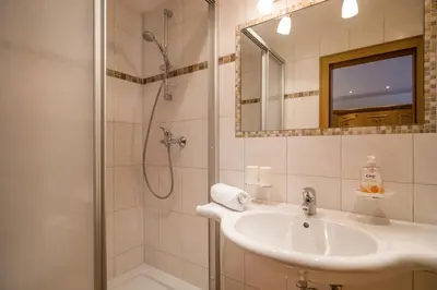 Ein Badezimmer in der Unterkunft Walchenhof