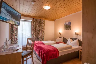 Ein Bett oder Betten in einem Zimmer der Unterkunft Walchenhof