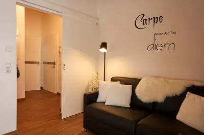 Ein Sitzbereich in der Unterkunft Appartementhaus Casamarai