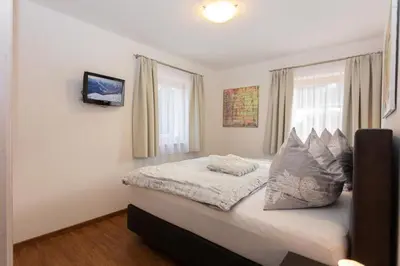 Ein Bett oder Betten in einem Zimmer der Unterkunft Appartementhaus Casamarai