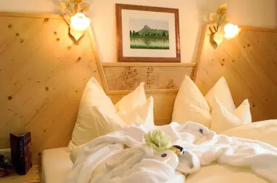 Ein Bett oder Betten in einem Zimmer der Unterkunft Hotel Gut Kramerhof