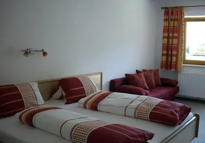 Ein Bett oder Betten in einem Zimmer der Unterkunft Ferienhaus Zillertal