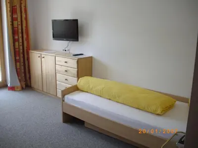 Ein Bett oder Betten in einem Zimmer der Unterkunft Ferienhaus Zillertal