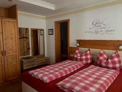 Ein Bett oder Betten in einem Zimmer der Unterkunft Apart Angela