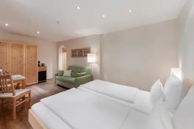 Ein Bett oder Betten in einem Zimmer der Unterkunft Gästehaus Bramböck