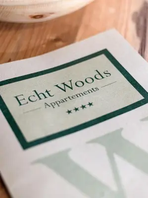 Ein Zertifikat, Auszeichnung, Logo oder anderes Dokument, das in der Unterkunft Echt Woods Appartements ausgestellt ist