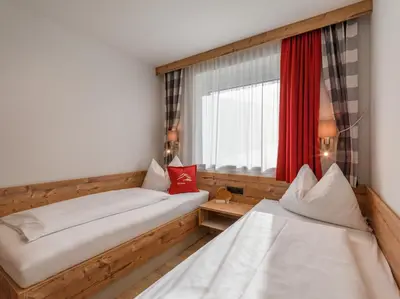 Ein Bett oder Betten in einem Zimmer der Unterkunft Echt Woods Appartements