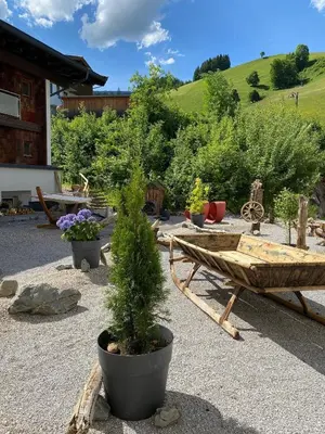 Ein Garten an der Unterkunft Hotel Residenz Hochalm - inklusive Joker Card im Sommer