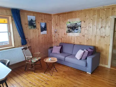 Ein Sitzbereich in der Unterkunft Fasserhof
