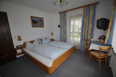 Ein Bett oder Betten in einem Zimmer der Unterkunft Gästehaus Fahringer
