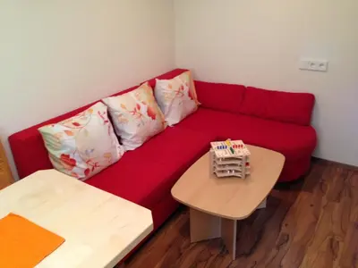 Ein Sitzbereich in der Unterkunft Appartements am See